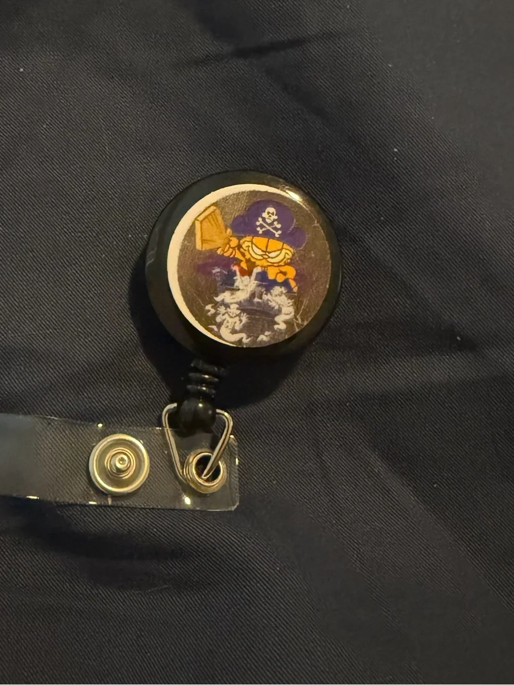 Black Pirate Badge Reel with Cartoon Pirate Graphic